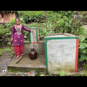 local woman at a water stand