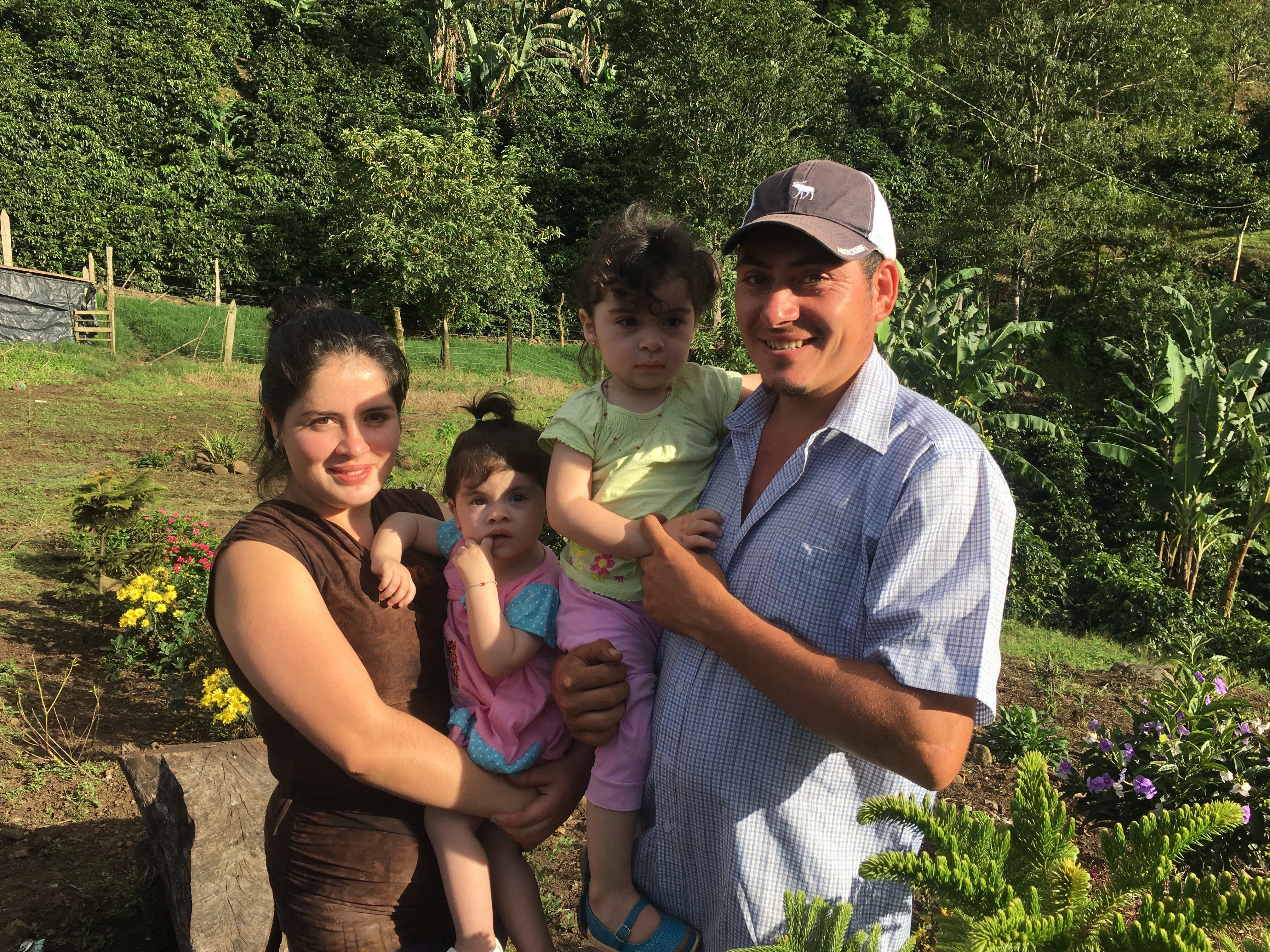 Farmers Emma and Jose with their children